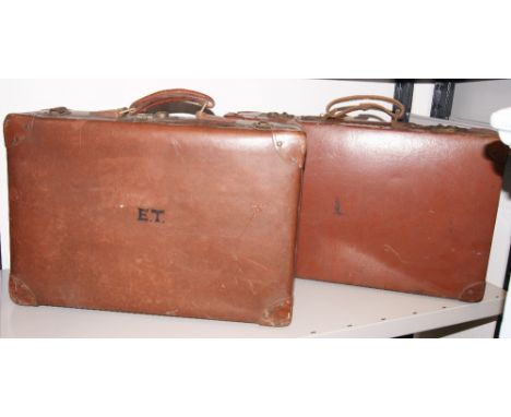 Two similar vintage suitcases CONDITION REPORT; Available on request. Catalogue descriptions and condition reports are offere
