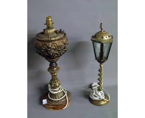 An impressive brass oil lamp base with electric conversion, together with another brass table-lamp CONDITION REPORT; Availabl