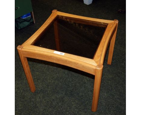 Contemporary Ercol oak rectangular coffee table with a square lamp table to accord. 
