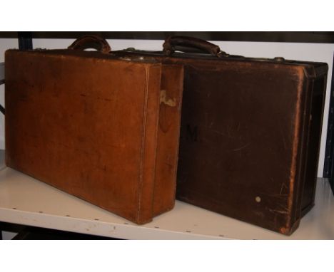 Two brown leather vintage suitcases CONDITION REPORT; Available on request. Catalogue descriptions and condition reports are 