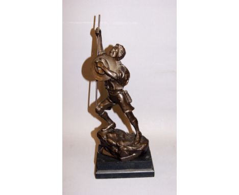 Bronzed figure of a boy scout in vintage dress. CONDITION REPORT; Available on request. Catalogue descriptions and condition 