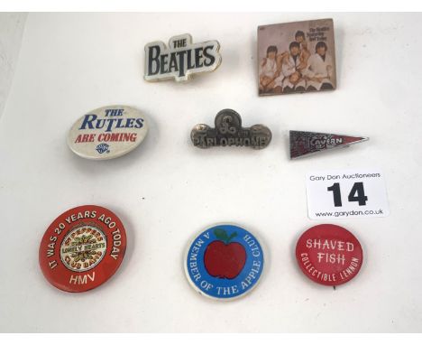 8 pinback badges - 'The Beatles Yesterday and Today', 'A Member of the Apple Club', 'The Beatles', 'The Cavern', 'Parlophone'