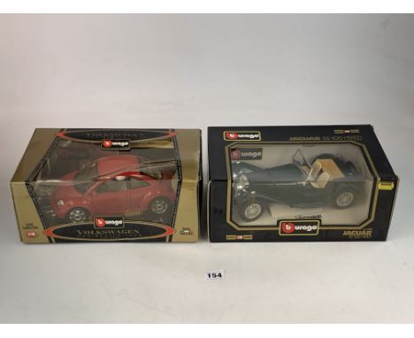 2 boxed Burago cars - Volkswagen New Beetle 1998 and Jaguar SS100 (1937), scale 1/18