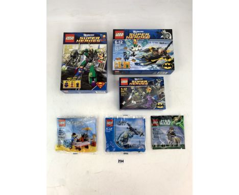 3 unopened boxes of Lego 'Super Heroes', nos. 6858 Catwoman Catcycle City Chase, 6862 Superman vs Power Armour Lex, 76000 Arc