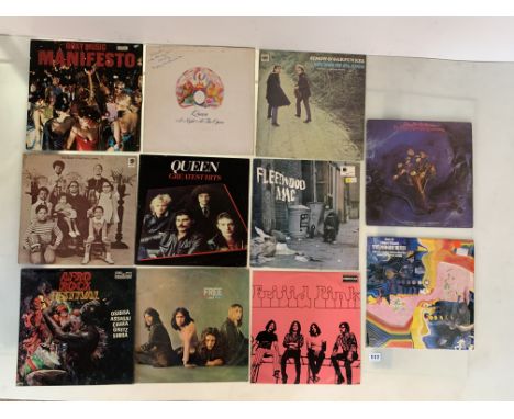 11 assorted LP records inc. Simon &amp; Garfunkel, Queen, Roxy Music, Moody Blues, Fleetwood Mac, Free, Frigid Pink, Afro Roc
