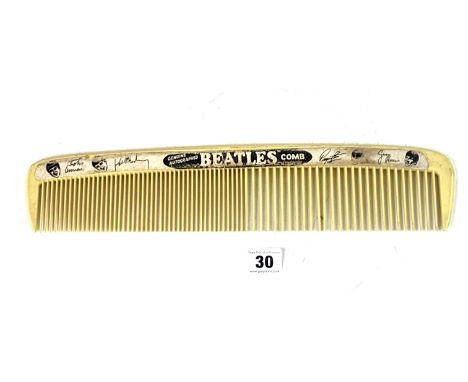 The Beatles autographed comb 15" long