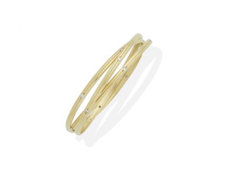 CARTIER: 'CONSTELLATION TRINITY' BANGLE, CIRCA 1989Brilliant-cut diamonds, signed Cartier, numbered B1788, manufacturer's mar