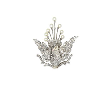 PEARL AND DIAMOND DOVE BROOCH, CIRCA 1890 AND LATERThe dove with outstretched wings, perching atop a branch, set throughout w