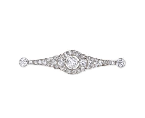 DIAMOND BROOCH, CIRCA 1930Old brilliant, brilliant, step and square-cut diamonds, three principal diamonds approx. 1.65cts to