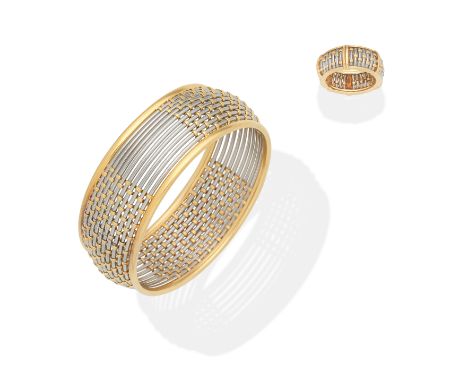 CARTIER: 'VISION' BANGLE AND RING SUITEInterwoven bicoloured wires, the ring set with graduating brilliant-cut diamonds, diam