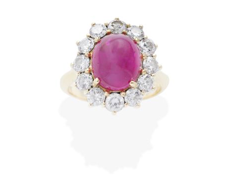 RUBY AND DIAMOND CLUSTER RINGThe sugarloaf cabochon ruby, within a brilliant-cut diamond surround,  diamonds approx. 1.20cts 