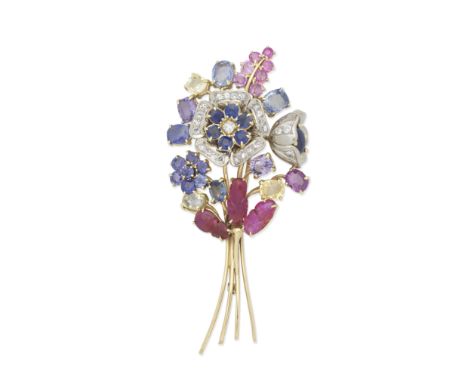 DIAMOND AND GEM-SET FLOWER BROOCH, CIRCA 1945Vari-cut and vari-coloured gemstones including rubies and sapphires, accented by