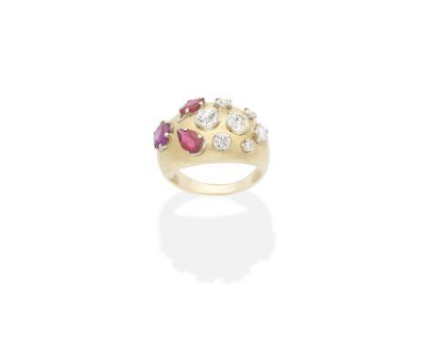 RUBY AND DIAMOND RINGOf brushed design, with circular-cut and pear-shaped rubies and old brilliant, brilliant and single-cut 