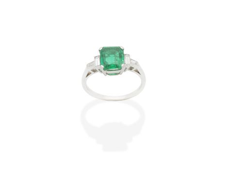 EMERALD AND DIAMOND RINGStep-cut emerald and baguette-cut diamonds, emerald very approx. 1.45cts, ring size approx. LFor furt