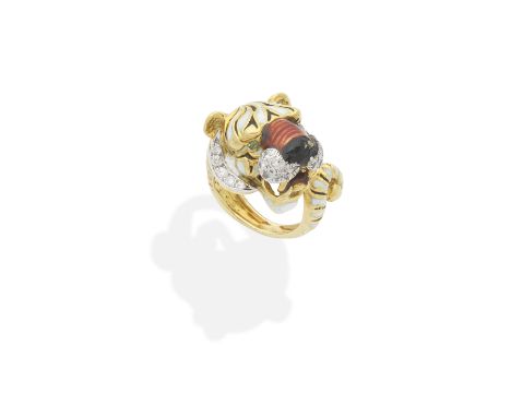 KUTCHINSKY: DIAMOND AND ENAMEL TIGER RING, 1972Decorated with polychrome enamel and brilliant-cut diamonds, with circular-cut
