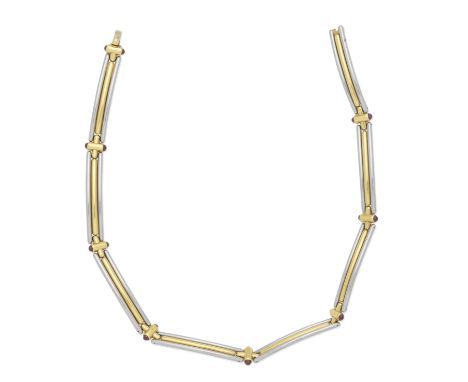 BULGARI: RUBY-SET BICOLOURED NECKLACE, CIRCA 1990Bicoloured, each link with reeded steel border, connected via baton hinges w