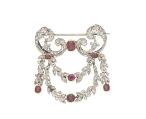 BELLE ÉPOQUE RUBY AND DIAMOND BROOCH,  CIRCA 1915The cushion-shaped ruby between scrolling motifs of cushion-shaped and rose-