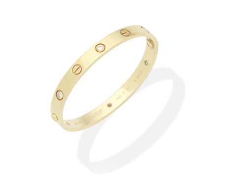 CARTIER: DIAMOND-SET 'LOVE' BANGLESix brilliant-cut diamonds, diamonds approx. 0.40ct total, signed Cartier, numbered, Swiss 