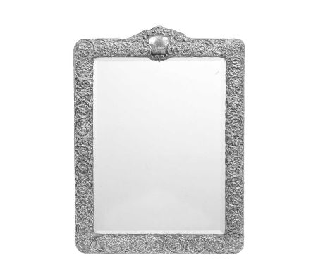 An Edward VII Silver-Mounted Dressing-Table Mirror, by Henry Matthews, Birmingham, 1905 oblong, the sides applied with openwo