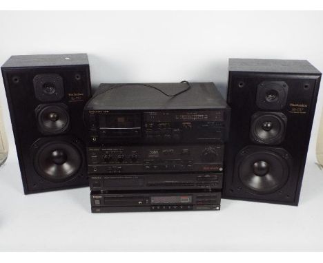 Technics stereo equipment to include a pair of speakers, compact disc player, stereo tuner, amplifier and a Harman Kardon TD2
