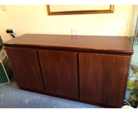 Skovby Mobelfabrik - A Danish, rosewood (Santos Rosewood) sideboard measuring approximately 61 cm x 156 cm x 48 cm. NOTE: LOT