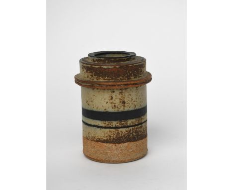 ‡ Robin Welch (1936-2019) a stoneware cylindrical vase, with modelled band and collar neck, painted with blue bands over ash,