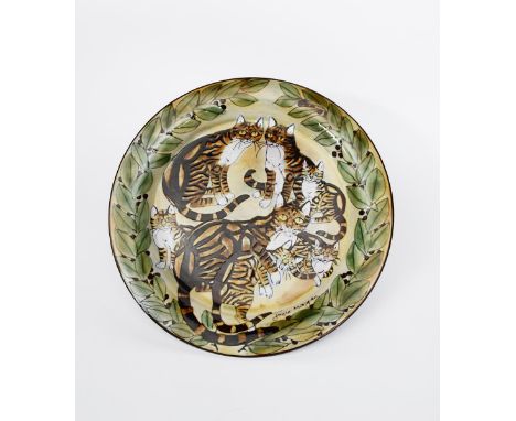 ‡ A Chelsea Pottery large charger by Joyce Morgan,  painted with a family of tabby cats, the rim with laurel border, in colou