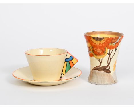 'Rhodanthe' a Clarice Cliff Bizarre vase,  shape no.572, waisted, ribbed form, painted in colours and a Clarice Cliff Bizarre