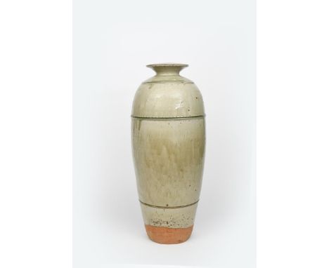 Richard Batterham (1936-2021) a tall three piece stoneware bottle vase, with raised border and chattering bands, covered to t