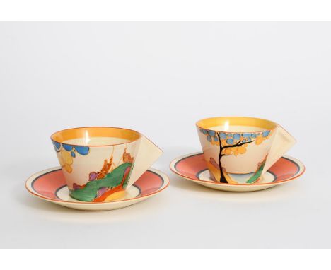 'Seven Colour Secrets' a pair of Clarice Cliff Fantasque Bizarre Conical tea cups and saucers,  painted in colours, the sauce