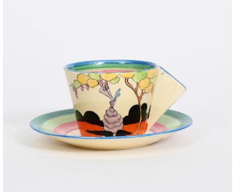 'Idyll' a Clarice Cliff Bizarre Conical coffee cup and saucer, painted in colours between pink, green and blue bands, printed