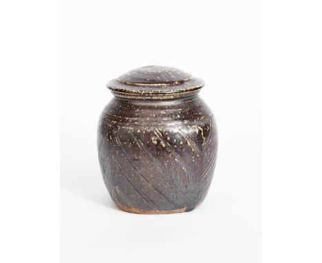 Richard Batterham  (1936-2021) a beaten salt-glaze stoneware jar and cover, with cut diagonal lines, unsigned, chip to foot r