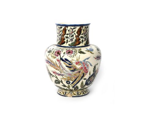 A Zsolnay Pecs pottery vase, shouldered baluster form with cylindrical neck, enamelled with stylised Persian bird amongst flo