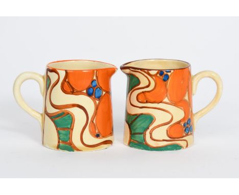 'Sunrise' a pair of Clarice Cliff Bizarre Tankard milk-jugs, painted in colours printed factory marks, 6.5cm. high (2) Proven