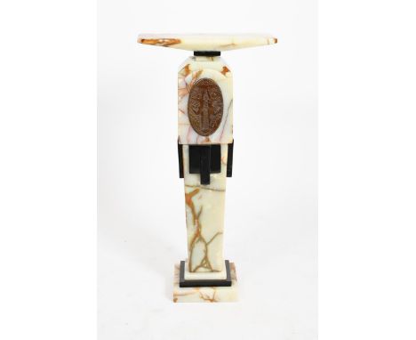 Demetre Chiparus (1886-1947) a patinated bronze, onyx and polished slate pedestal stand, tapering square section set with a b