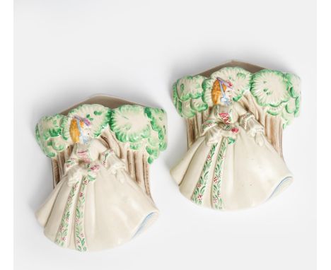 'Lady Anne' two wall pockets, model no.868, modelled in low relief and painted in colours on a mushroom ground, a Clarice Cli