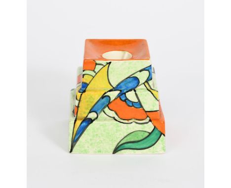 'Zap' a Clarice Cliff Bizarre stepped candlestick, shape no.391, painted in colours on a green cafe au lait ground, printed f