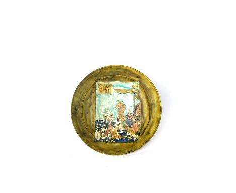 A rare Gateshead Art Pottery charger possibly by J G Sowerby, painted with a rectangular panel to the well of a stylised Japa