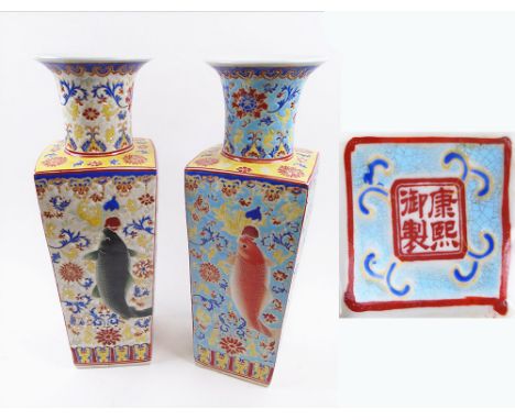 CHINESE VASES, a pair, 20th century ceramic, each decorated carp, on a turquoise ground filled with traditional flowering des