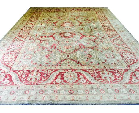 FINE PERSIAN BIDJAR CARPET, 471cm x 343cm, garous design of palmettes and vines on a jade field within complimentary bands an