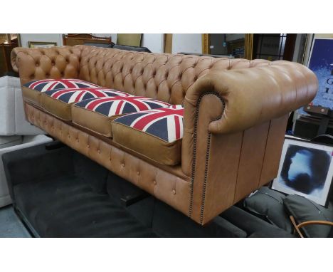 CHESTERFIELD SOFA, 73cm H x 246cm W x 90cm D, tan leather with four union jack seat cushions. 