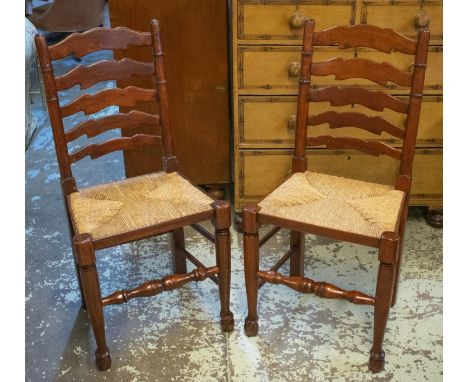 DINING CHAIRS, each 47cm W x 96cm H, a set of six hardwood with ladder backs and rush seats. (6) 