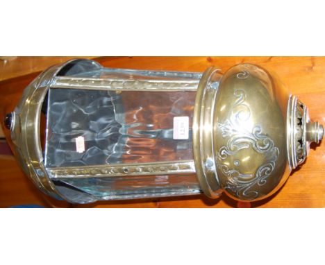 A Dutch brass and glass inset domed pentagon shaped hanging pendant light, having lower embossed floral decoration, h.52cm