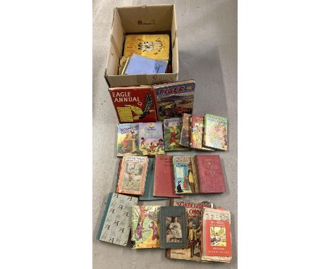 A box of vintage children's books to include Eagle Annual No. 9, Tiger annual and a number of titles by Enid Blyton. 