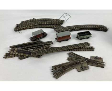 A small collection of vintage Hornby Dublo/Meccano tinplate railway track together with 3 tinplate coaches. 