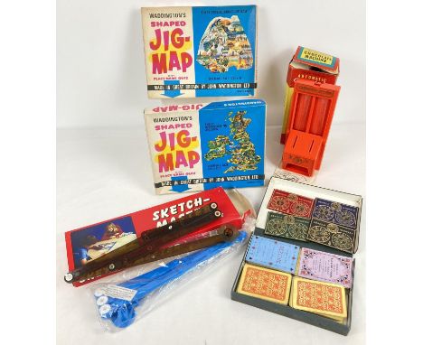 A small collection of vintage toys and games. To include 2 boxed Waddington's Shaped Jig-Maps, boxed Peter-Pan Chocolate Mach