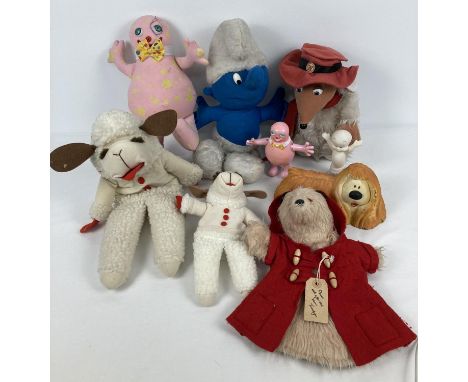 A collection of vintage children's TV related character toys. To include: Lamb Chop hand puppets, Mr. Blobby, Smurf, rubber M