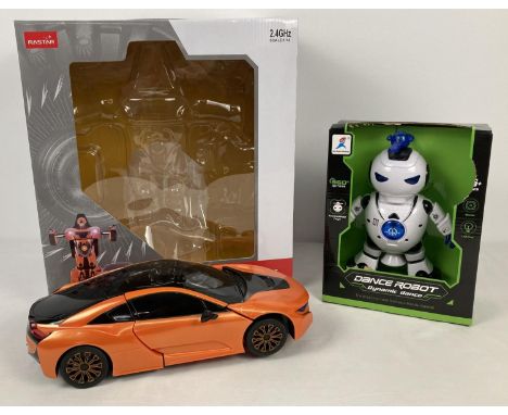 2 modern boxed robot toys. A 1/14 scale Rastar Transformable car together with an unopened Dance Robot with lights and music.