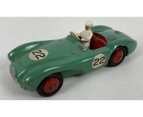 A 1956-1959 vintage Dinky Toys Green DB3 Aston Martin racing car with No 22 decals. Complete with driver. Good condition with