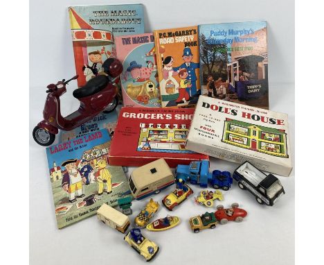 A box of assorted toys to include: teaching jig-saws, Barbie Vespa bike, vintage annuals and diecast cars. 